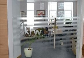 Компания UALCOM в банке «KFW».